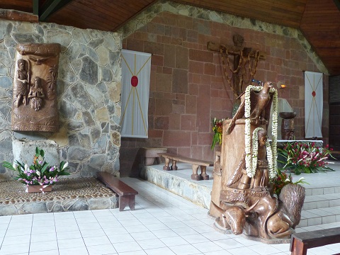 Local flowers and wood carving inside the Cathedral in Taiohae on Nuku Hiva May 2015